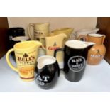 Ten various ceramic whisky water jugs including Black & White, Haig, VAT 69, Dewar's etc (in section
