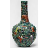 A late Qing/ Early Republic Wucai porcelain vase of globular form, the body moulded, pierced and