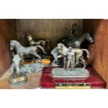 Eleven various resin horse figures, busts and trophies, including an example of Mill Reef with