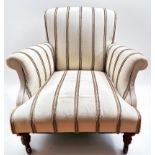 An armchair with sprung seat and back, with scrolled arms and upholstered all-over with brown-