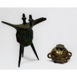 A small cast bronze censor and cover of organic form with rustic handles, Xuande four character mark