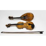 A violin with two-piece maple back and ribs and spruce top; bears label 'Antonius Stradivarius