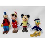 Four Walt Disney figures, for Blue Chip Marketing, comprising Mickey Mouse, Donald Duck, Goofey