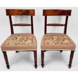 A pair of 19th century mahogany standard chairs with table crest rails and rope-twist mid-rails,