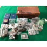 A box of British and foreign coins mostly 20th century but there are some later and a number of