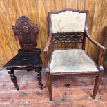 An Edwardian parlour carver chair, and 19th Century stained oak hall chair