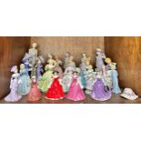 A collection of twenty-two assorted ceramic figures, predominantly modelled as ladies in fine gowns,