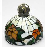 A large Tiffany style coloured glass ceiling lampshade, white glass shade with red flowers and green