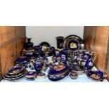 A collection of assorted Limoges navy blue and gilt ornaments, some marked ‘La Reine’, including