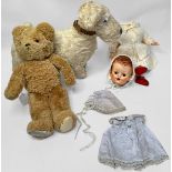 Three assorted children’s toys; a 1950s Pedigree composition doll, with sleepy eyes, knitted