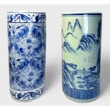 Two modern Oriental blue and white porcelain umbrella stands of plain cylindrical form, one