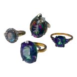 Three various 9ct yellow gold ladies dress rings, all set with mystic topaz gemstones, together with