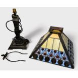A 20th Century Tiffany-style table lamp, square pyramid shaped, coloured glass and lead shade,