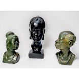 Two African carved verdite stone busts of a native man and woman, approximately 20cm high,