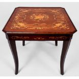 An Italian Sorrento marquetry games table inlaid with floral clusters, stylised leaves and