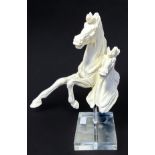 A Royal Doulton 'Millennium 2000' limited edition Parian porcelain model of two horses with bodies