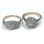 Two 9ct gold cluster design dress rings, set with white faceted stones, total weight 4.7 grams.