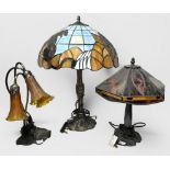 Three various Tiffany 'style' table lamps with organic bases and coloured acrylic and glass shades