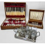 An oak canteen of James Dixon and Sons silver-plated cutlery for six people, ivorine handles,