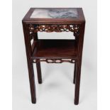 A Chinese rosewood two-tier occasional table, of rectangular form, with inset white marble top,