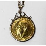 A George V 1912 22ct gold Sovereign, in 9ct gold mount, on 9ct gold chain, gross weight