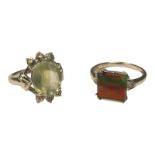 A 9ct white gold dress ring set with a square cut Canadian Ammolite, measuring 10mm, 2.75cts, with a