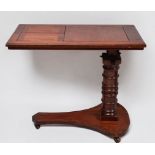 A Victorian mahogany over-bed reading table, of rectangular form, with ratchet rise and fall, and