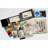A collection of assorted mint and used QEII GB and world stamps comprising an album of Jersey