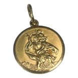 A 9ct yellow gold large St Christopher pendant, weighs 9.3 grams.