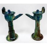 A pair of 19th century pottery oil lamps, in the Whieldon ware style with green, blue, yellow and