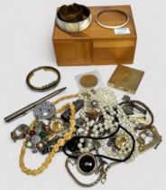 A small collection of assorted gold jewellery including a St Christopher pendant, a bracelet with