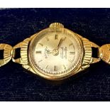 A ladies 9ct gold Rotary wristwatch, the silvered dial dial with batons denoting hours, on 9ct