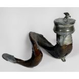 A ram's horn snuff mull with white-metal mounts and eagle finial to the hinged cover, 30cm long
