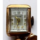 A 14ct gold lapel/brooch watch by Crosby, the silver and white dial with Arabic numerals denoting