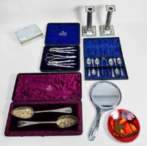 A small collection of assorted silver and silver-plated wares comprising a cased pair of berry