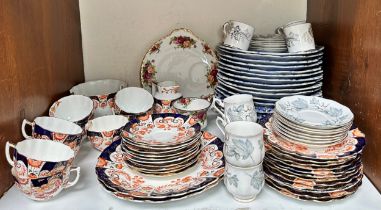 A collection of mixed ceramics, comprising, a part tea service, decorated with hand-painted red