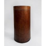 A brown leather cylindrical umbrella stand by ‘The Holding Company’, 50cm tall