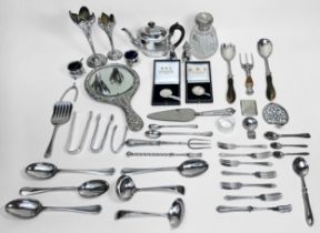 A small collection of assorted silver including a pair of tongs modelled as a wishbone and a pair of