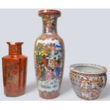 A large hand-painted Oriental Satsuma baluster vase decorated with panels of figural scenes and
