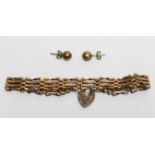 A 9ct yellow gold four-bar gate bracelet, together with a pair of 9ct gold ball stud earrings, total