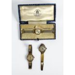 Three various 9ct gold ladies wristwatches, including a Tissot example, all on gold-plated