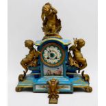 A 19th Century French porcelain and gilt-metal mounted mantel clock, with eight-day movement by