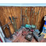 A good collection of assorted vintage gardening tools including a Greens patent lawnmower and an