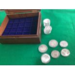 This lot comprises approximately 24 pure silver limited edition coins/medallions all in plastic