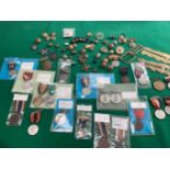 A collection of military and other buttons and school attendance medals, some with the prices paid