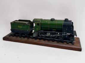 Three assorted ‘O’ gauge locomotives and tenders comprising, a Lionel 1110 2-4-2 locomotive and 1001