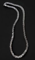 A 9ct white gold flat snake link necklace, with matching bracelet, total weight 11.5 grams.