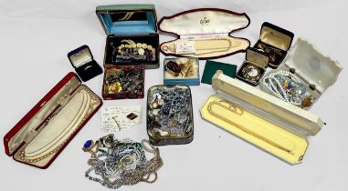 An assortment of various costume and silver jewellery, including simulated pearls, amethyst bead