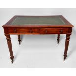A Victorian mahogany side table, with gilt-tooled green leather scribe, above two frieze drawers,