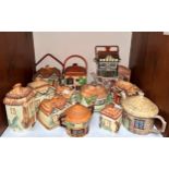 Thirty-three various Cottageware ceramic teapots, jugs, butter dish and biscuit barrels, comprising,